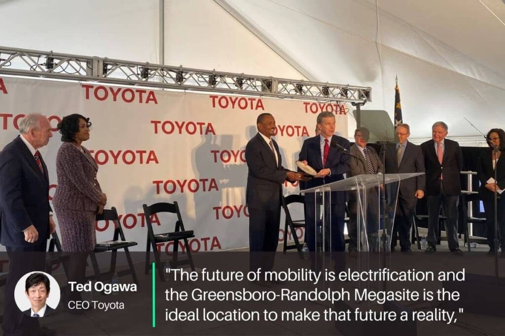 Image of toyota ceo Ted ogawa announcing a new electric vehicle battery plant in  US, north Carolina