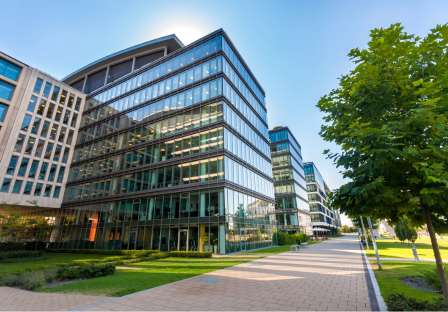 Image of a EV charging station outside office and hospital building