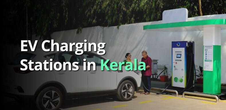 a couple charging an electric car in an EV charging hub in Kerala
